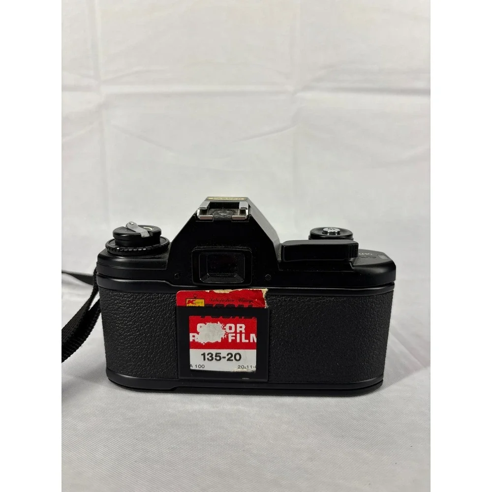 Nikon EM 35mm Film SLR Camera 50mm f/1.8 Lens Black Compact Vintage Japan